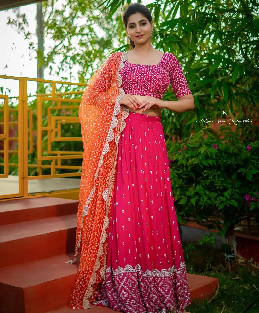 Varshini Sounderajan Wearing Orange Lehenga Choli